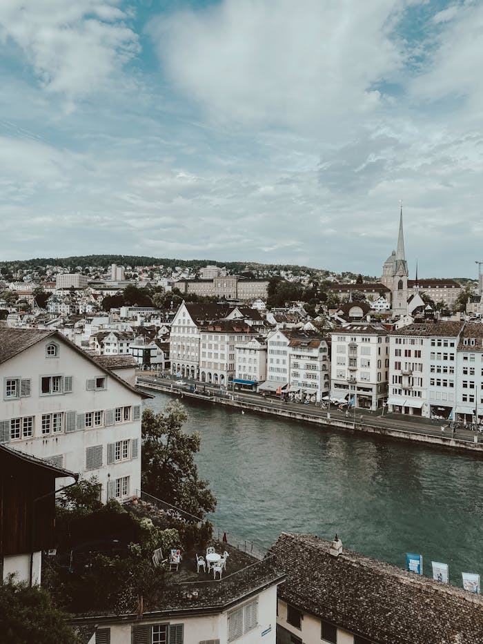 About Charming cityscape of Zurich with the Limmat River and historic buildings from Lindenhof.